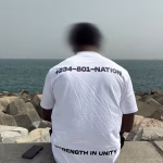 Drop 1 now live ⏰DAVREL NATION Message +234 9128088178 to order (1) Nation by DTV White T-Shirt